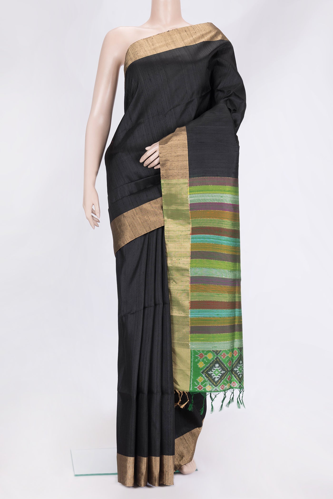 Black Dual Tone Raw Silk Saree with Plain Body and Zari Border.  displayed on a mannequin