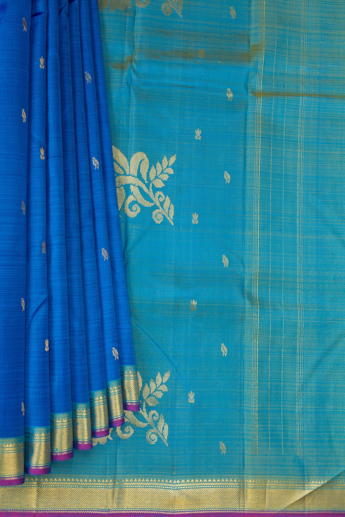 Pleats and pallu of Royal Blue Kanchipuram Silk Saree with Zari Butta on the body and Zari Border. 