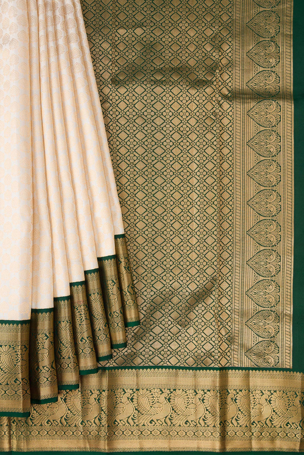 Pleats and pallu of Off White Kanjivaram Silk Saree with Zari Brocade on the body and Zari Border. 