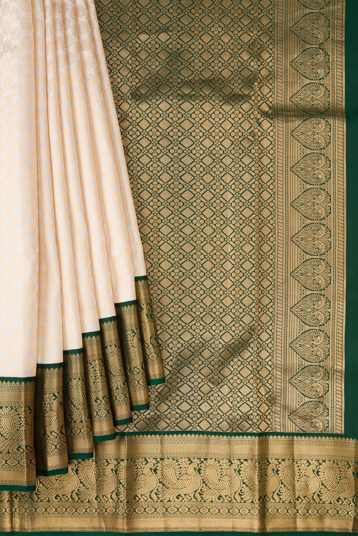 Pleats and pallu of Off White Kanjivaram Silk Saree with Zari Brocade on the body and Zari Border. 