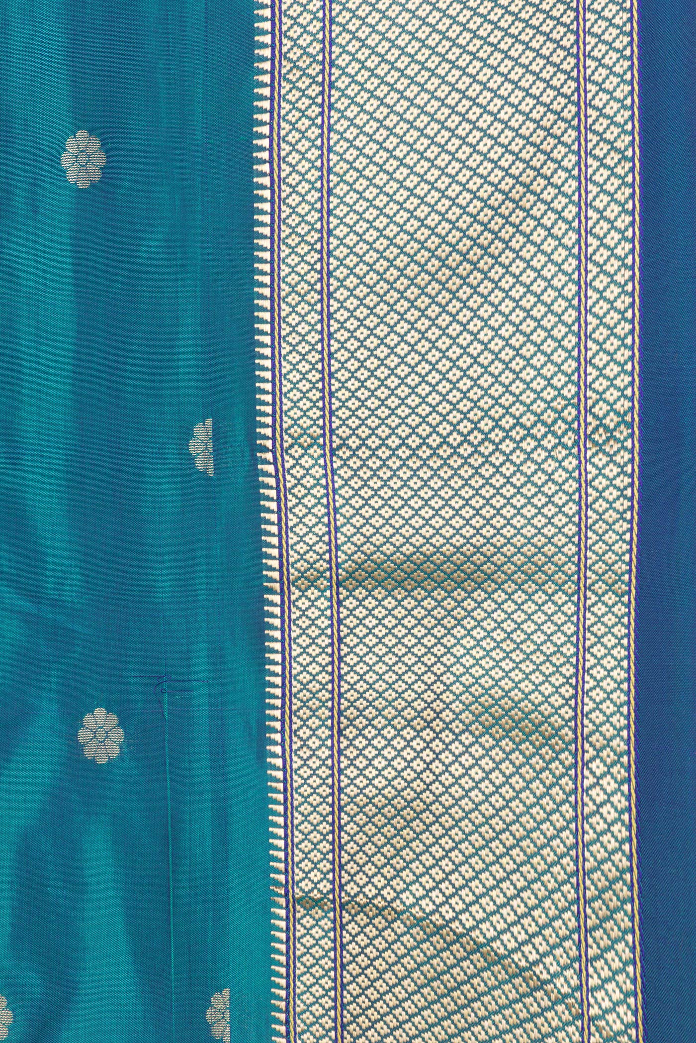 Border image of Peacock Blue Dual Tone Paithani Silk Saree with Zari Butta on the body and Zari Border. 