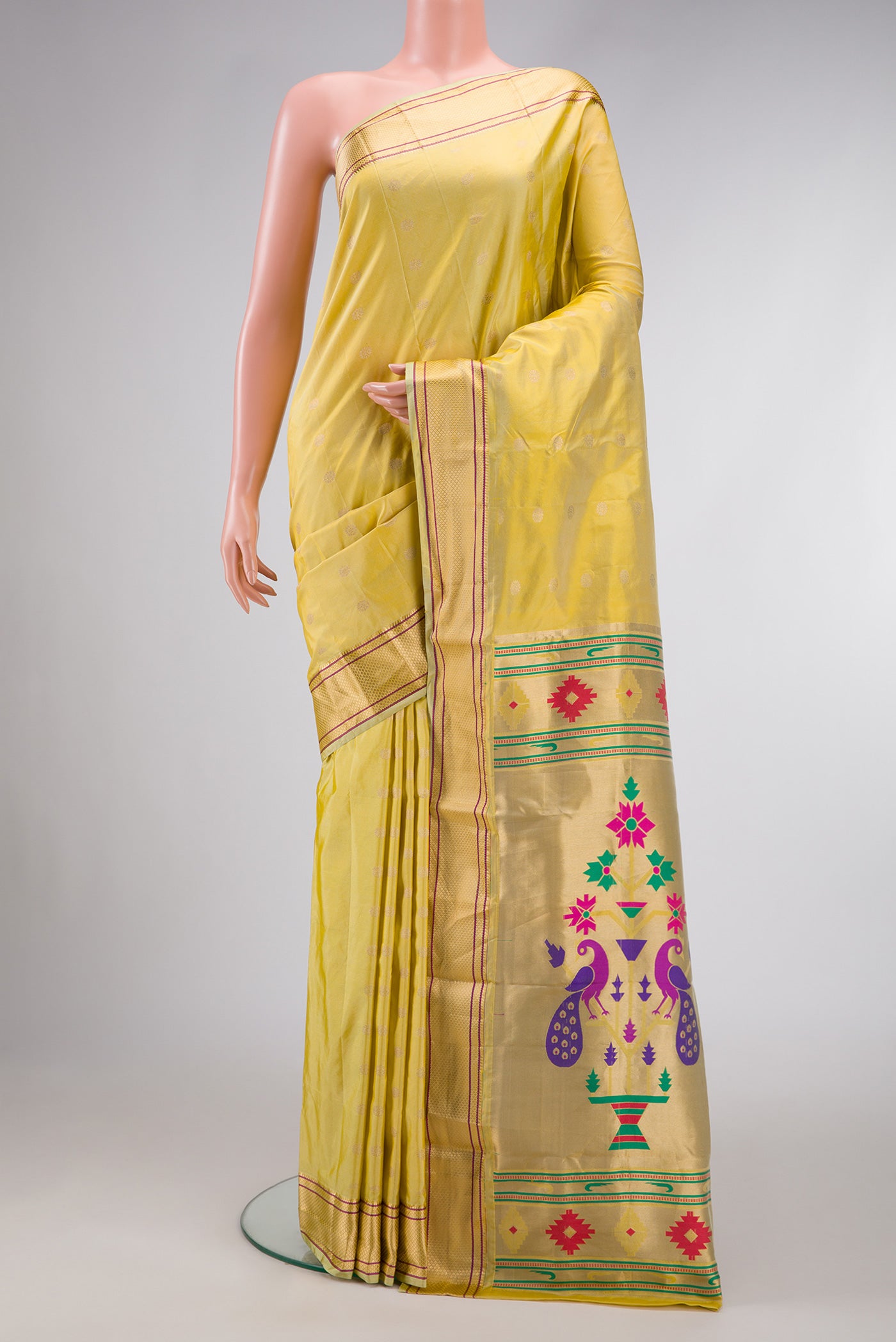Sandal Dual Tone Blended Paithani Silk Saree with Zari Butta on the body and Zari Border.  displayed on a mannequin