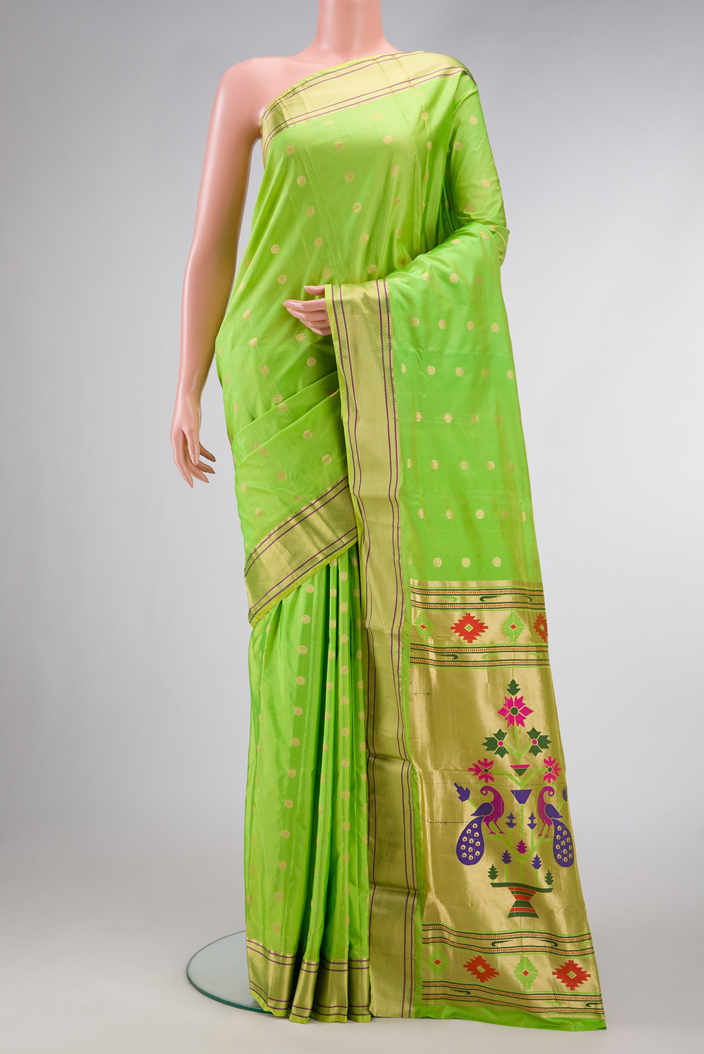 Parrot Green Dual Tone Blended Paithani Silk Saree with Zari Butta on the body and Zari Border.  displayed on a mannequin