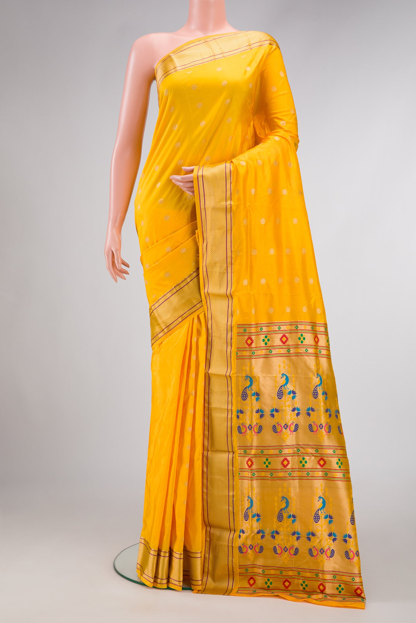 Yellow Dual Tone Blended Paithani Silk Saree with Zari Butta on the body and Zari Border.  displayed on a mannequin