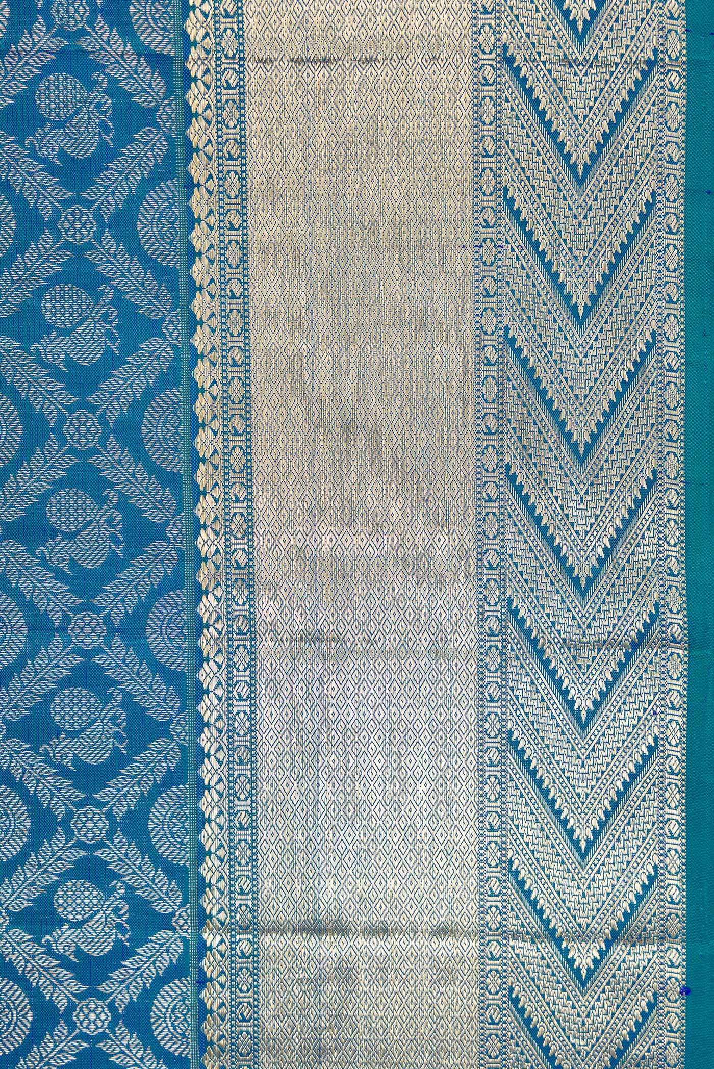 Border image of Peacock Blue Dual Tone Kanchipuram Silk Saree with Zari Brocade on the body and Zari Border. 