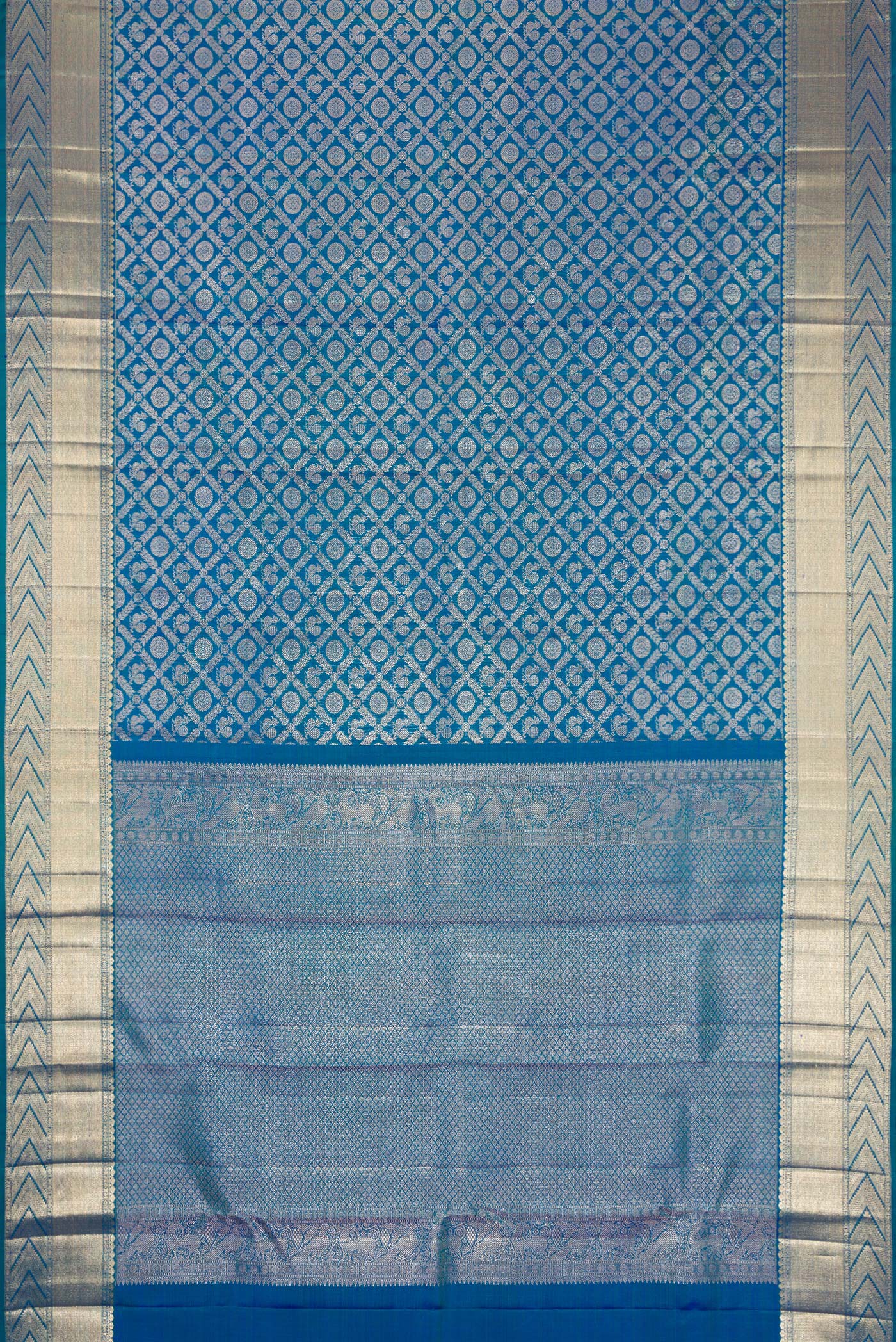 Flat view of Peacock Blue Dual Tone Kanchipuram Silk Saree with Zari Brocade on the body and Zari Border. 