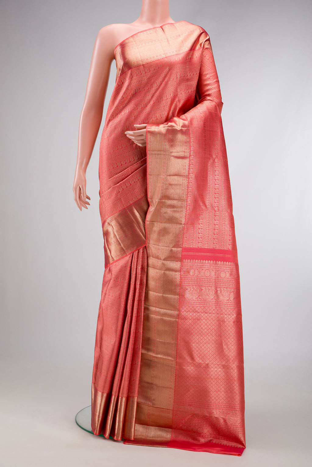 Pink Dual Tone Kanchipuram Silk Saree with Zari Brocade on the body and Zari Border.  displayed on a mannequin