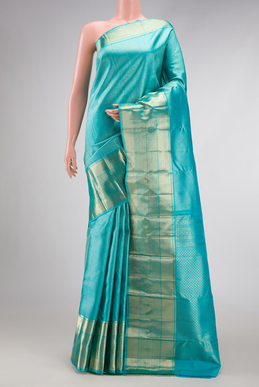 Sky Blue Dual Tone Kanchipuram Silk Saree with Zari Brocade on the body and Zari Border.  displayed on a mannequin