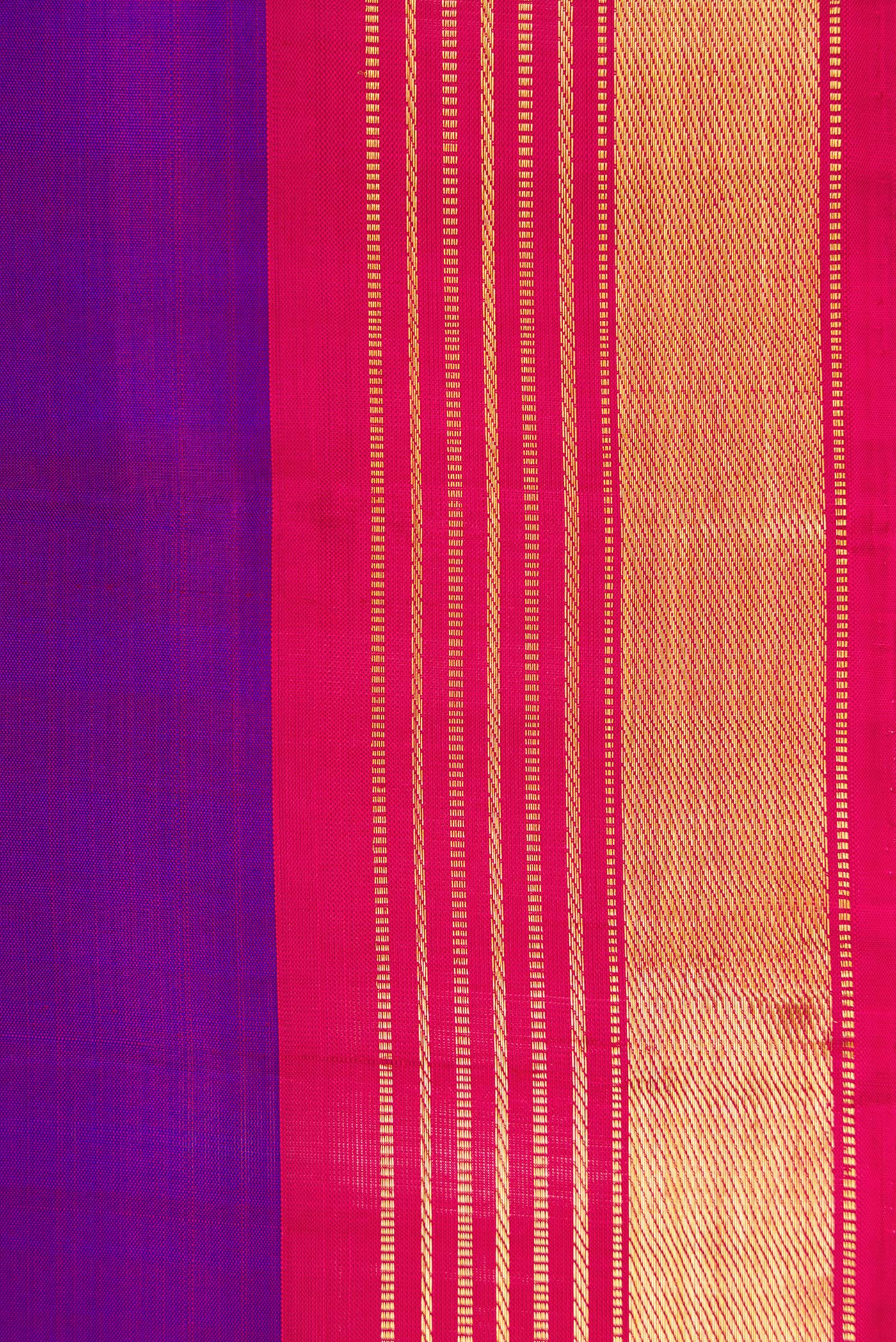 Border image of Purple Dual Tone Kanjivaram Silk Saree with Plain Body and Zari Border. 