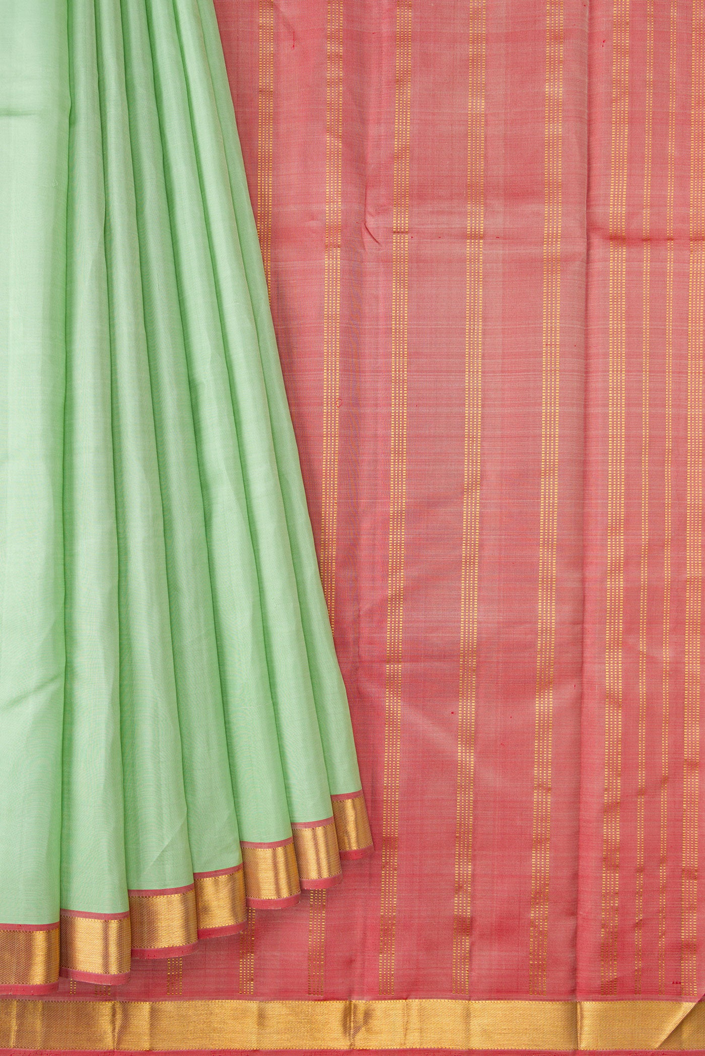 Pleats and pallu of Pista Green Dual Tone Kanjivaram Silk Saree with Plain Body and Zari Border. 