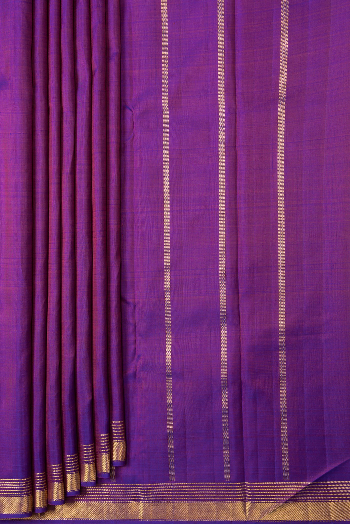 Pleats and pallu of Purple Dual Tone Kanjivaram Silk Saree with Plain Body and Zari Border. 