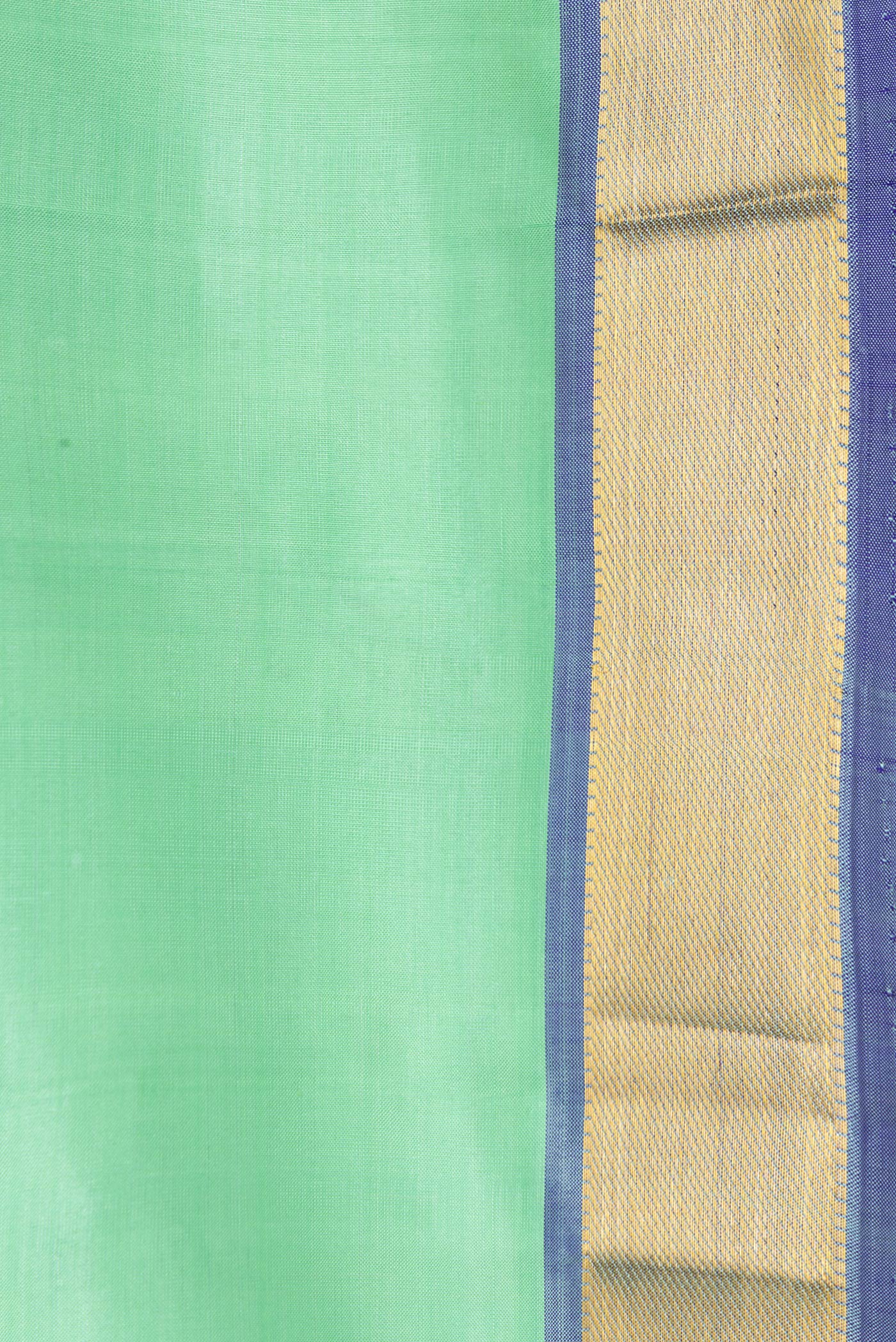 Border image of Sea Green Dual Tone Kanjivaram Silk Saree with Plain Body and Zari Border. 