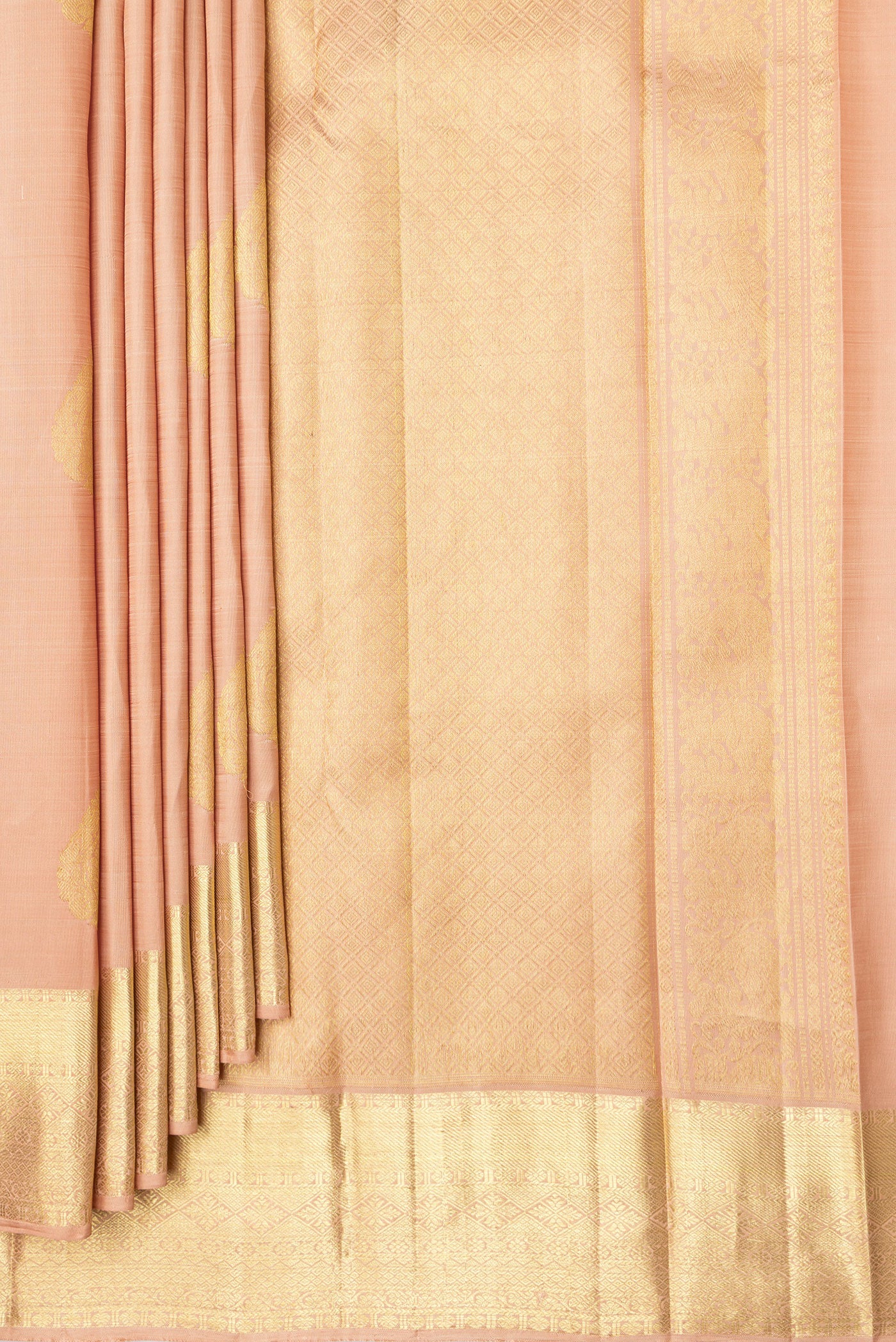 Pleats and pallu of Golden Peach Dual Tone Kanjivaram Silk Saree with Zari Butta on the body and Zari Border. 