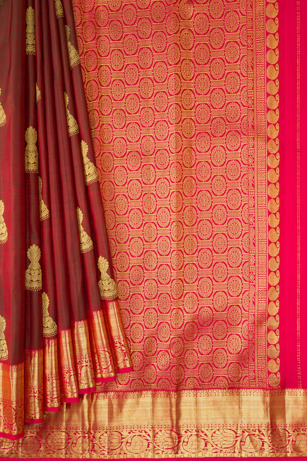 Pleats and pallu of Maroon Dual Tone Kanjivaram Silk Saree with Zari Butta on the body and Zari Border. 