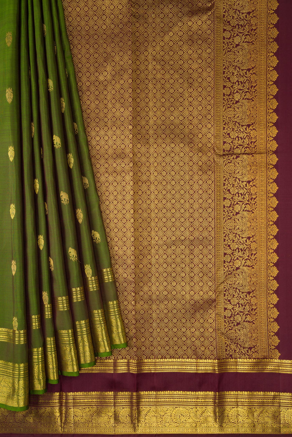 Pleats and pallu of Mehandi Green Dual Tone Kanjivaram Silk Saree with Zari Butta on the body and Zari Border. 