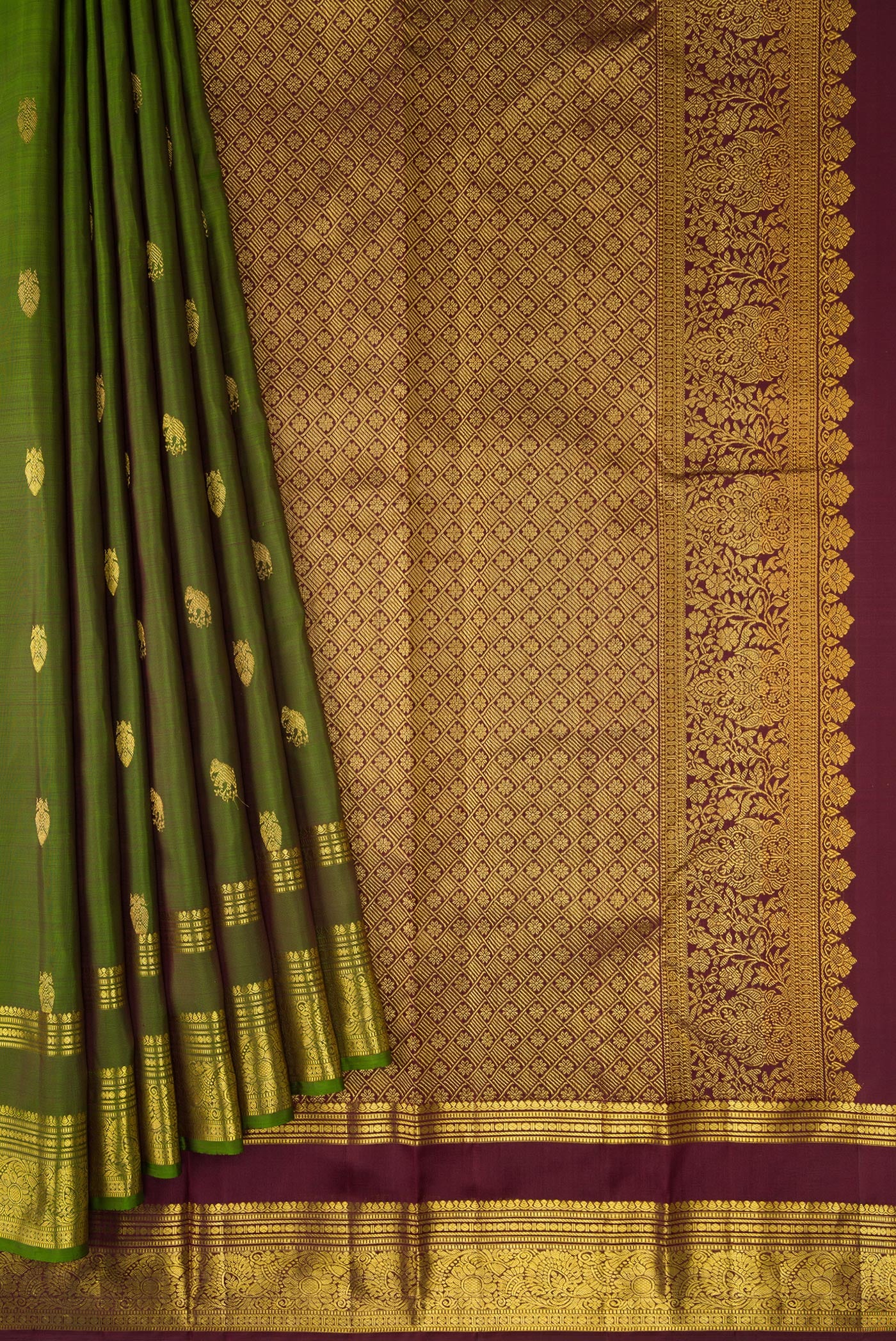 Pleats and pallu of Mehandi Green Dual Tone Kanjivaram Silk Saree with Zari Butta on the body and Zari Border. 