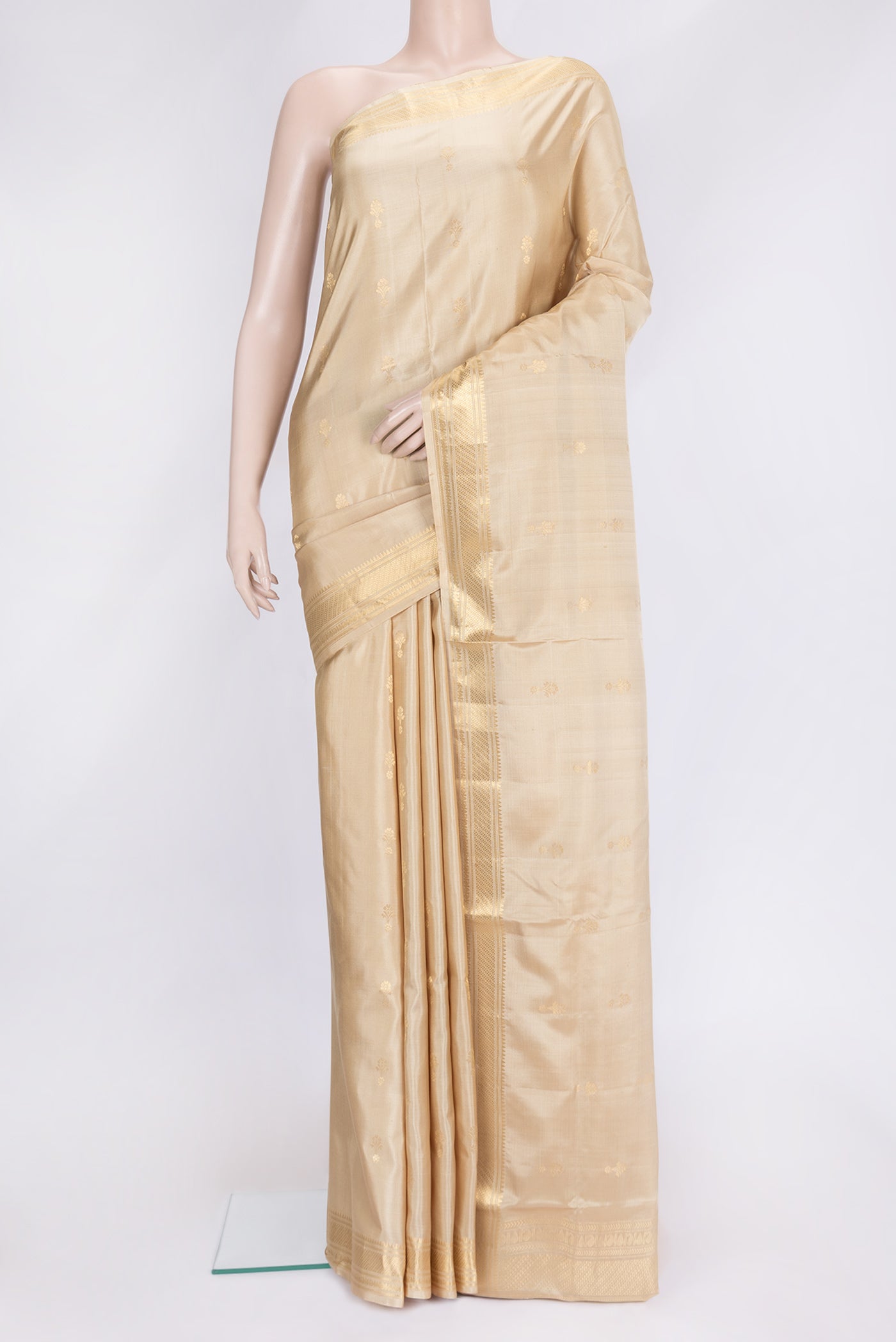 Sandal Dual Tone Soft Silk Saree with Zari Butta on the body and Zari Border.  displayed on a mannequin