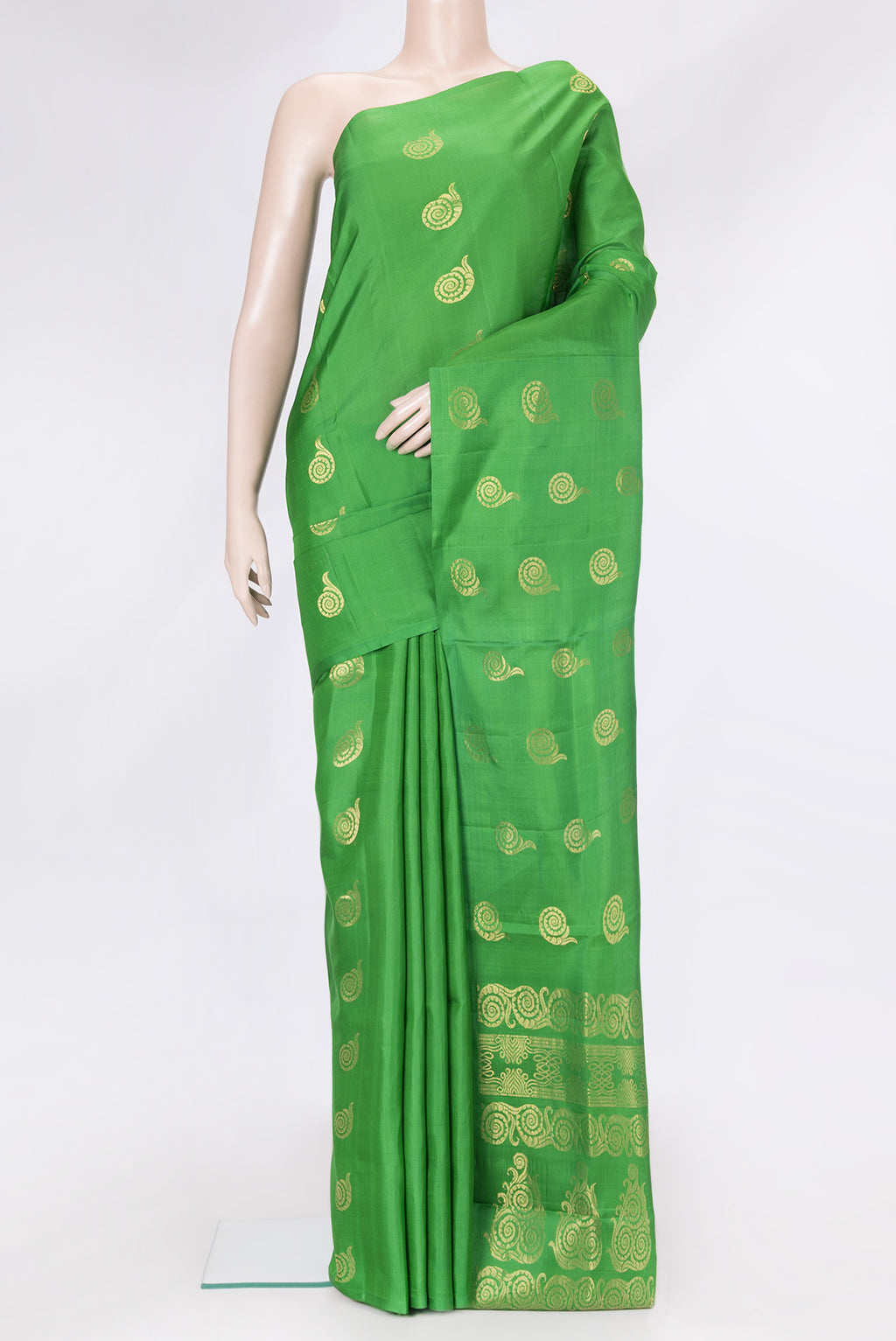 Green Dual Tone Soft Silk Saree with Zari Butta on the body and Without Border.  displayed on a mannequin