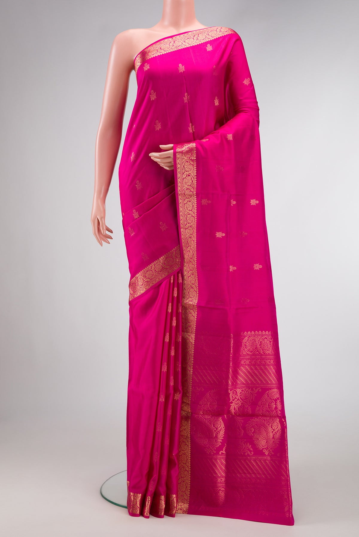 Pink Dual Tone Soft Silk Saree with Zari Butta on the body and Zari Border.  displayed on a mannequin