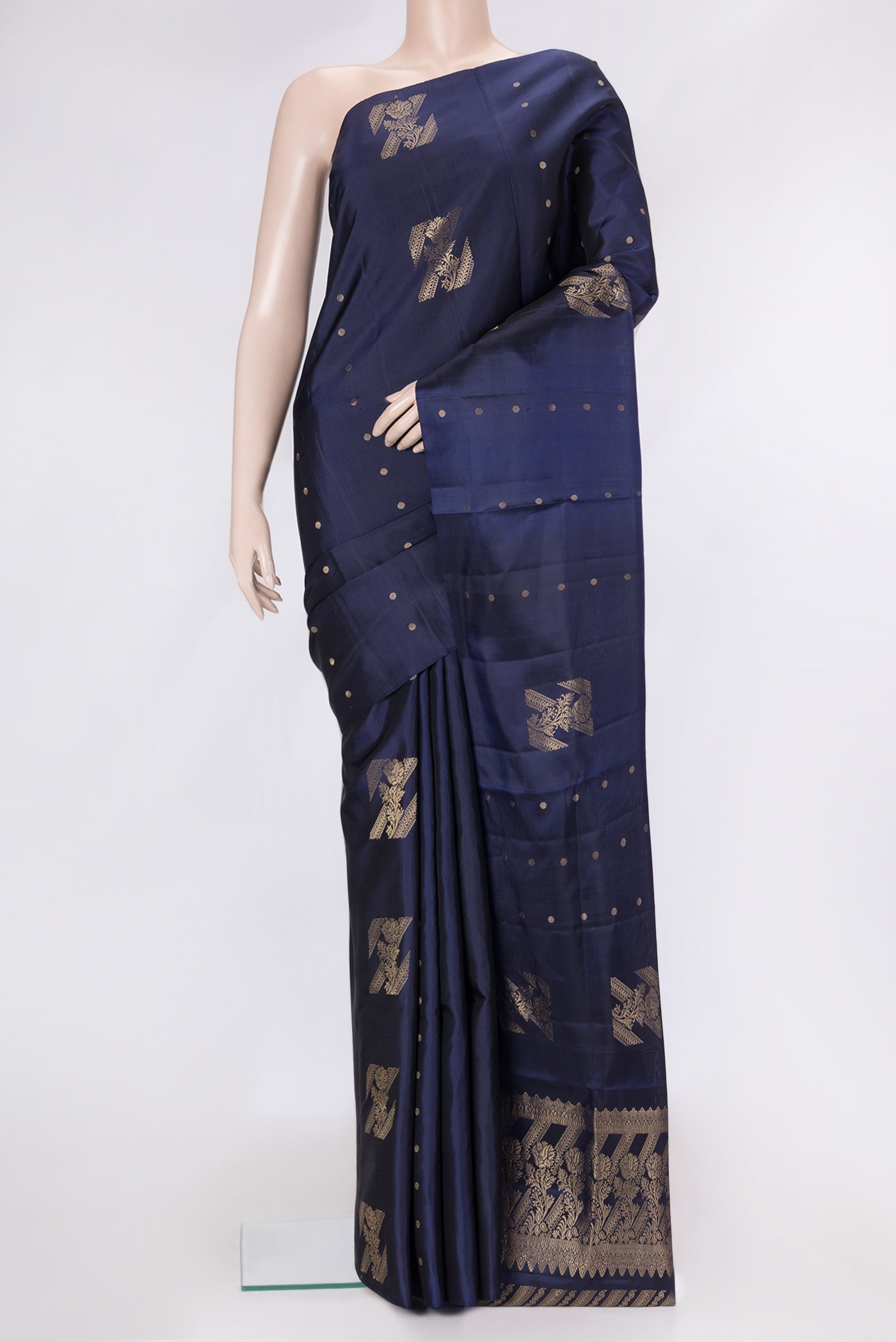 Navy Blue Dual Tone Soft Silk Saree with Zari Butta on the body and Without Border.  displayed on a mannequin