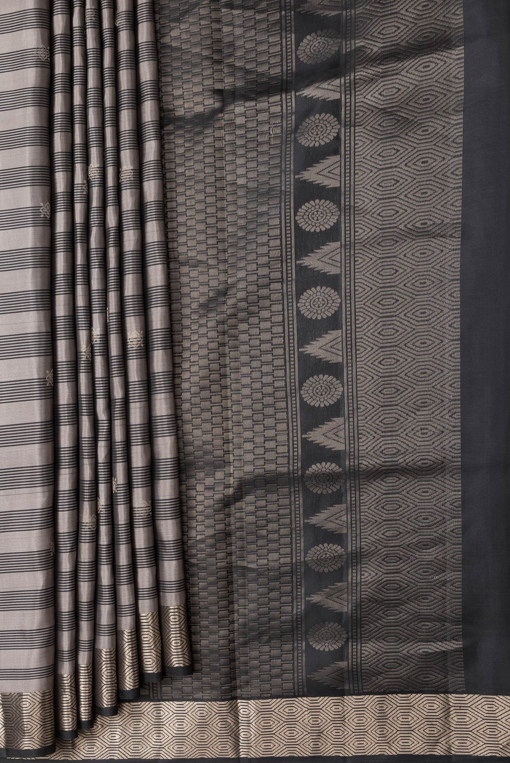 Pleats and pallu of Grey Dual Tone Soft Silk Saree with Stripes on the body and Zari Border. 