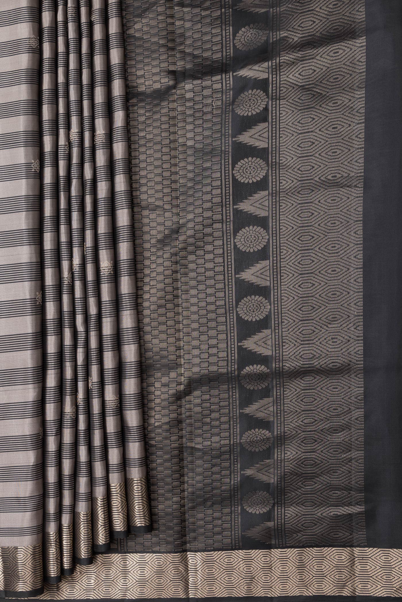 Pleats and pallu of Grey Dual Tone Soft Silk Saree with Stripes on the body and Zari Border. 