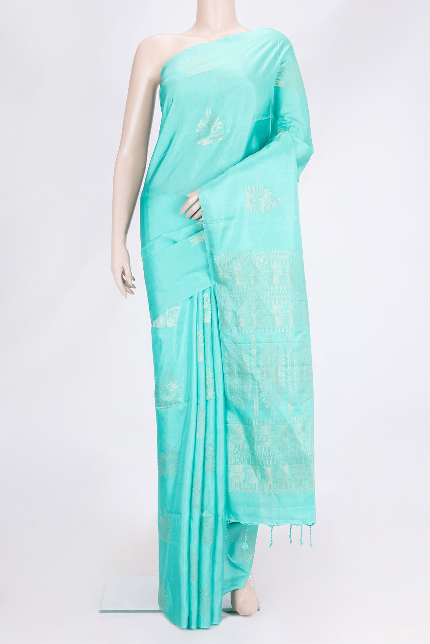 Sky Blue Dual Tone Soft Silk Saree with Zari Butta on the body and Without Border.  displayed on a mannequin