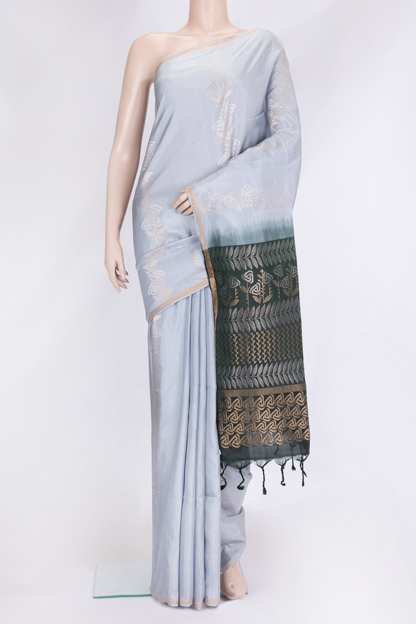 Grey Dual Tone Soft Silk Saree with Zari Butta on the body and Zari Border.  displayed on a mannequin