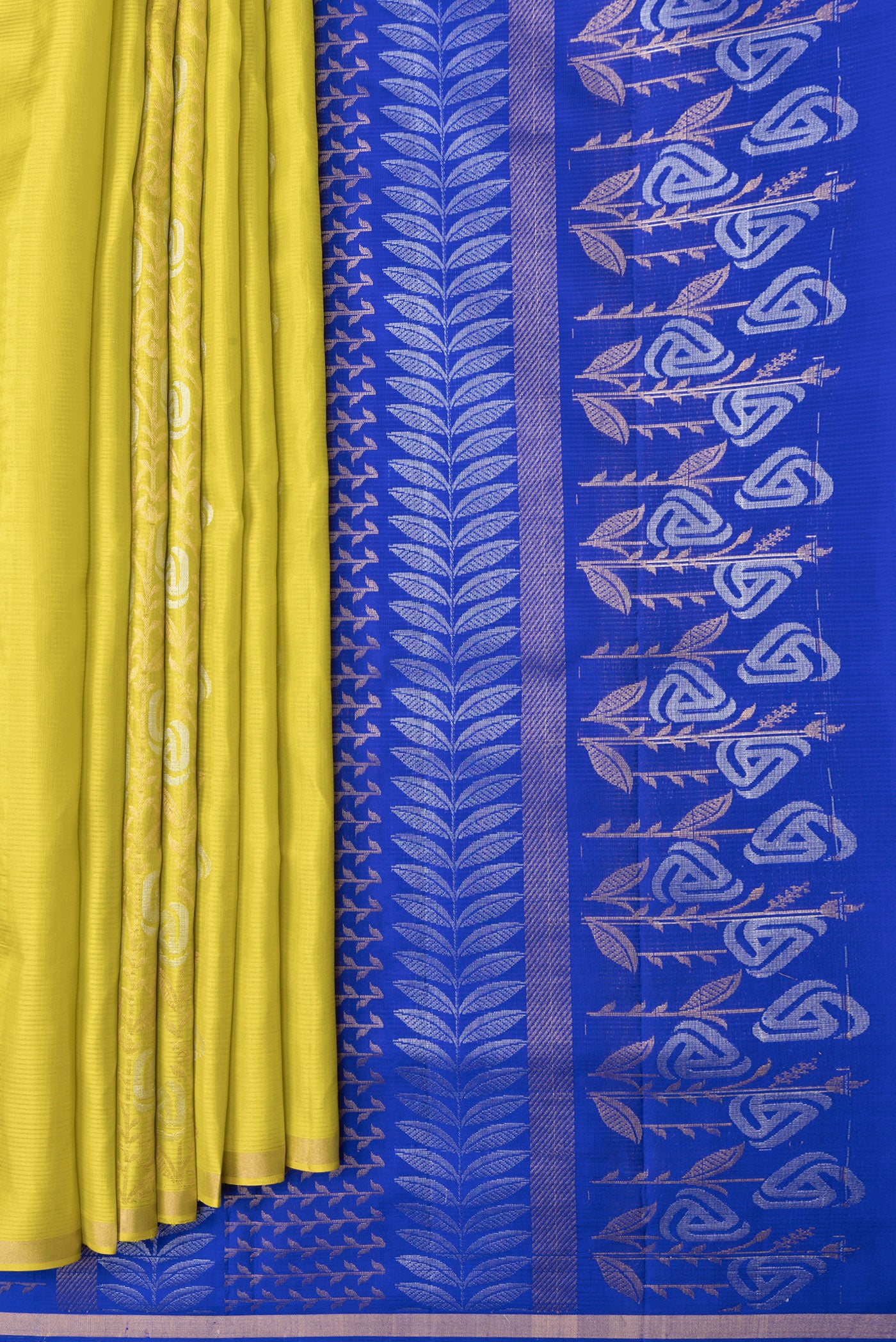 Pleats and pallu of Parrot Green Dual Tone Soft Silk Saree with Zari Butta on the body and Zari Border. 