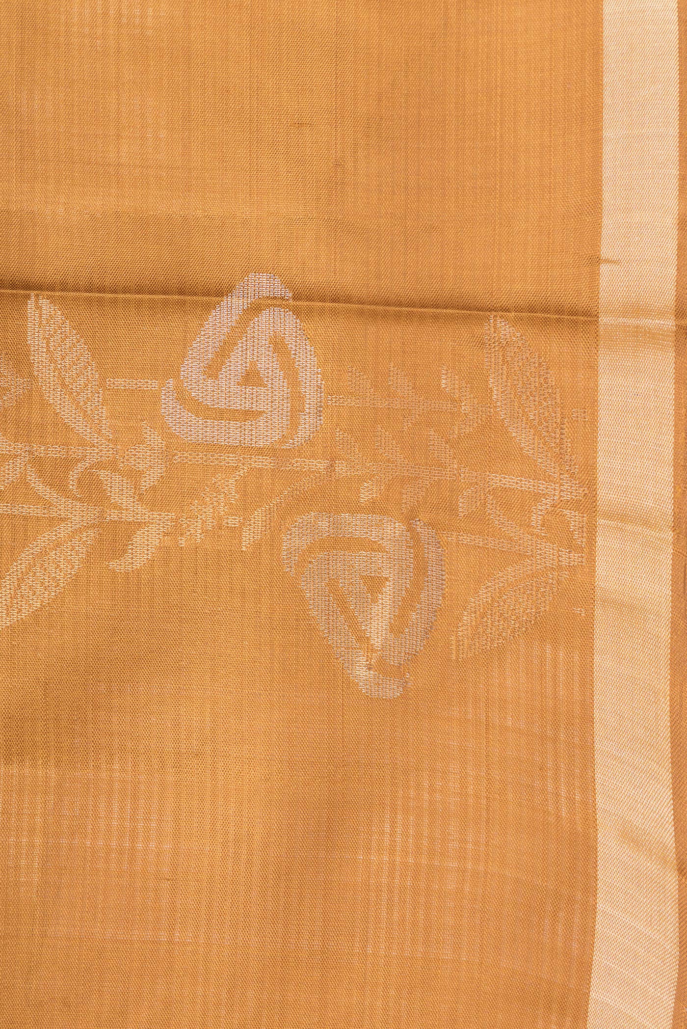 Border image of Mustard Dual Tone Soft Silk Saree with Zari Butta on the body and Zari Border. 