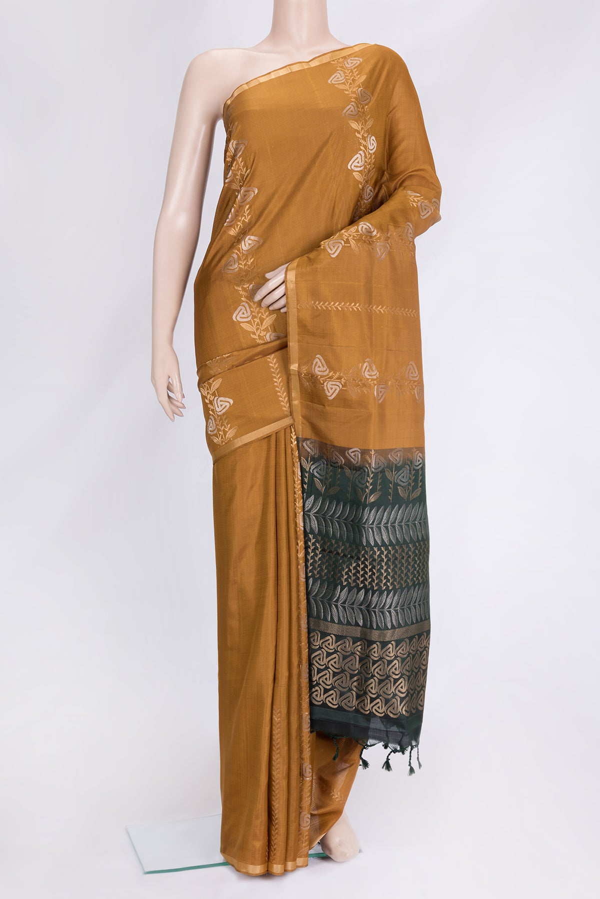 Mustard Dual Tone Soft Silk Saree with Zari Butta on the body and Zari Border.  displayed on a mannequin