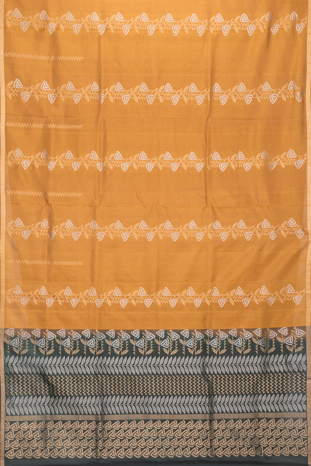 Flat view of Mustard Dual Tone Soft Silk Saree with Zari Butta on the body and Zari Border. 