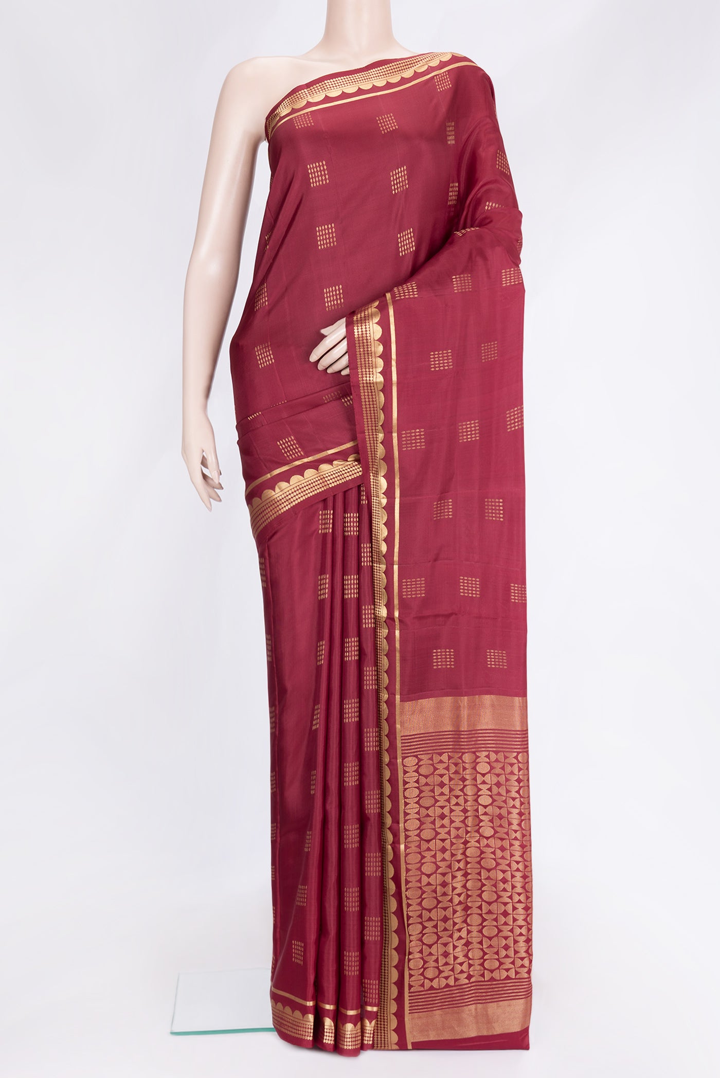 Maroon Dual Tone Soft Silk Saree with Zari Butta on the body and Zari Border.  displayed on a mannequin