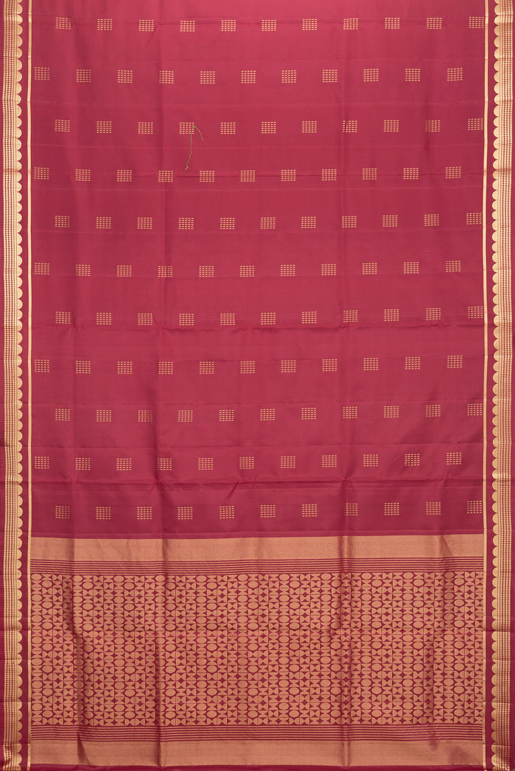 Flat view of Maroon Dual Tone Soft Silk Saree with Zari Butta on the body and Zari Border. 