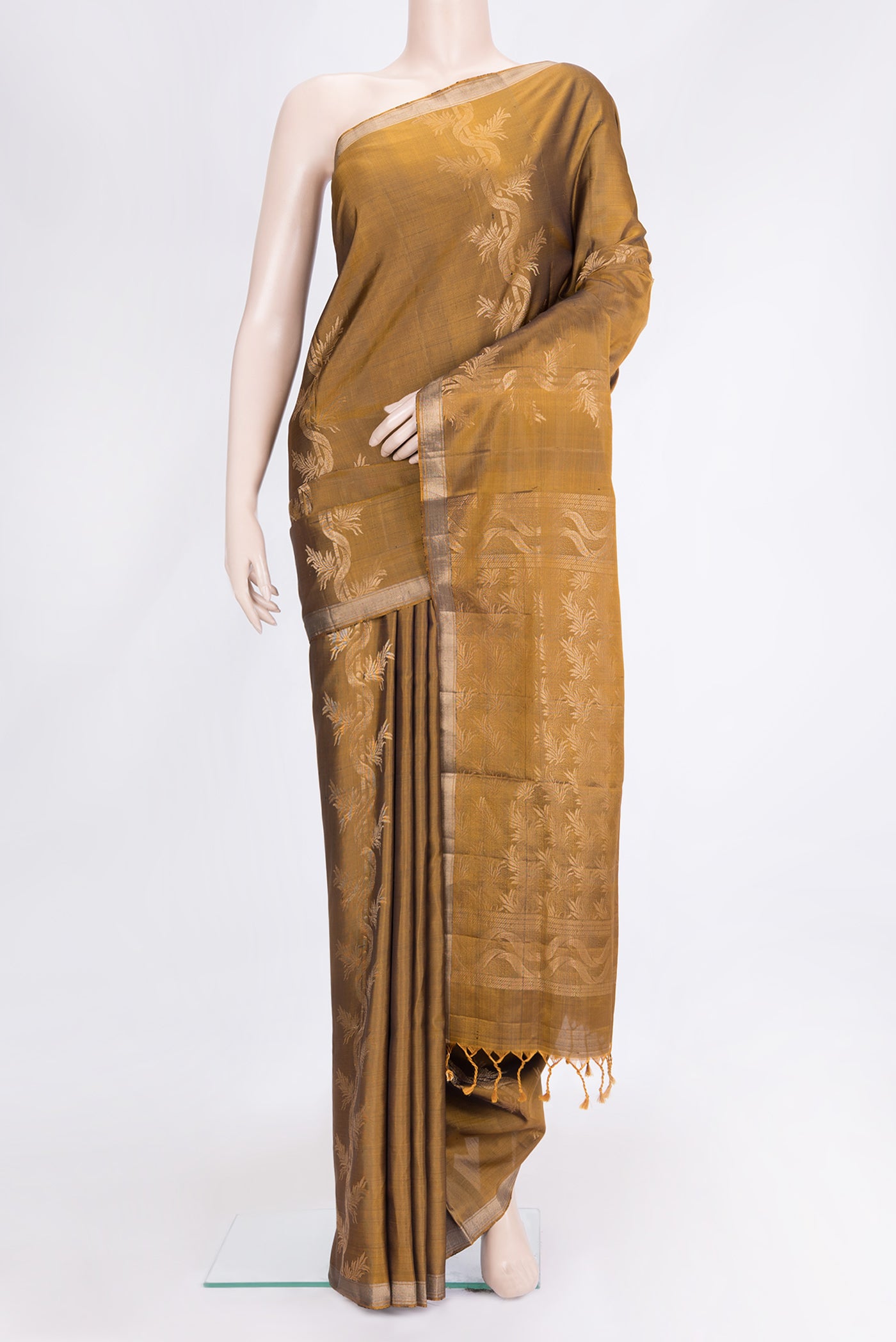 Gold Dual Tone Soft Silk Saree with Zari Butta on the body and Zari Border.  displayed on a mannequin