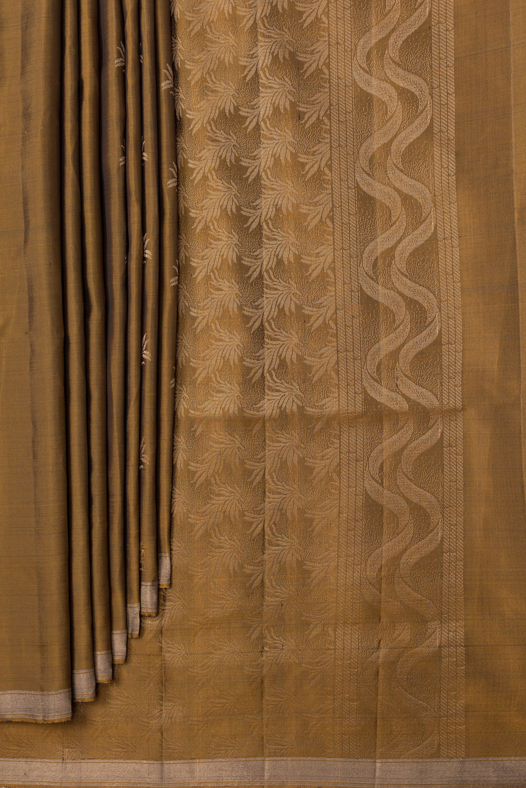Pleats and pallu of Gold Dual Tone Soft Silk Saree with Zari Butta on the body and Zari Border. 