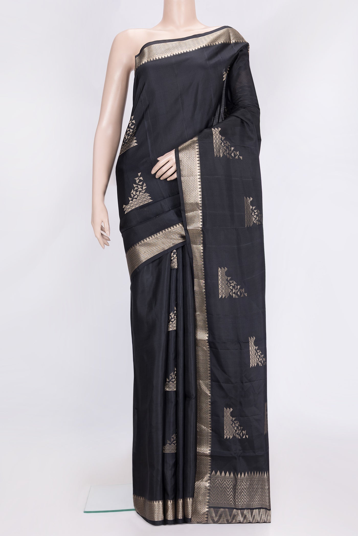 Black Dual Tone Soft Silk Saree with Zari Butta on the body and Zari Border.  displayed on a mannequin