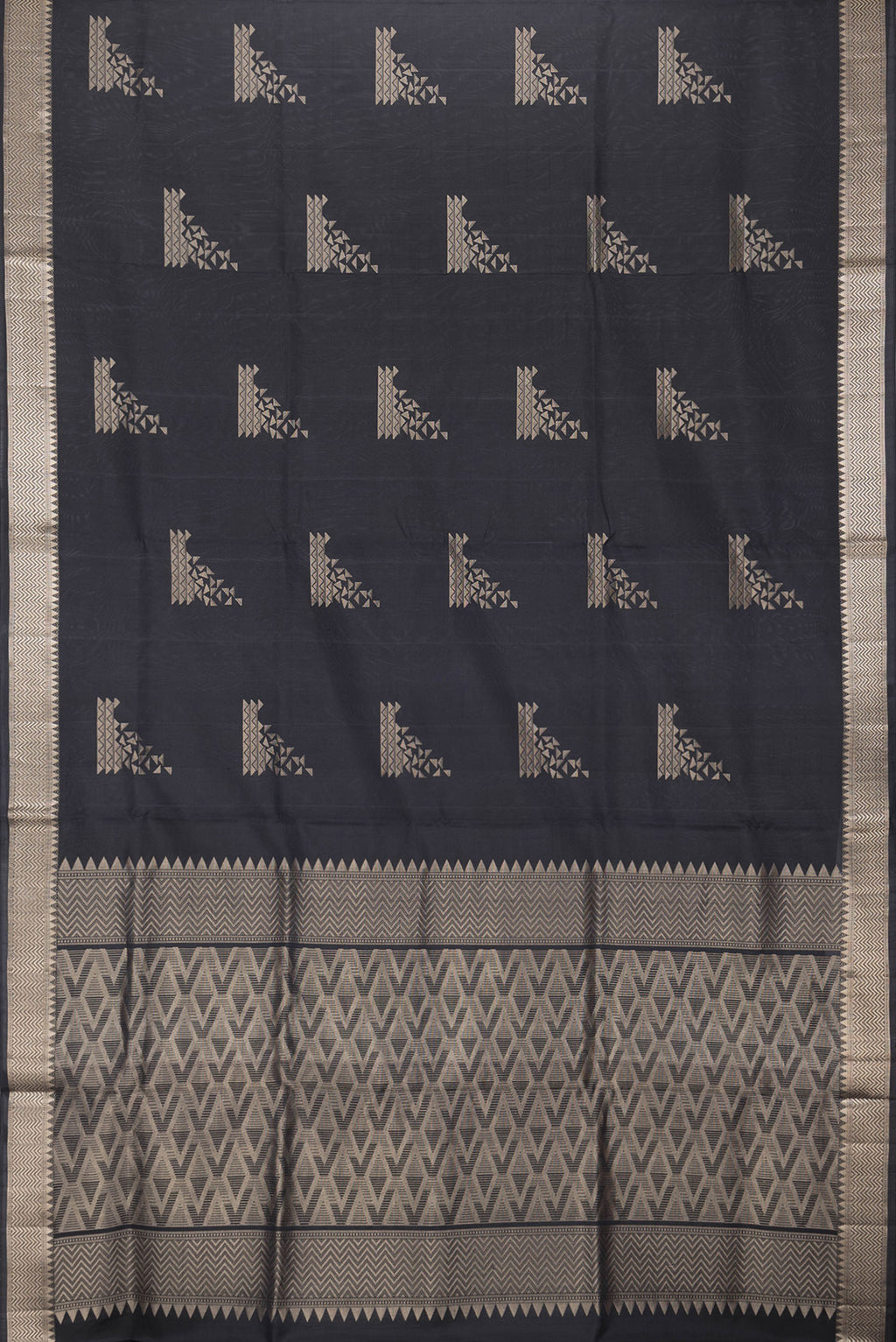 Flat view of Black Dual Tone Soft Silk Saree with Zari Butta on the body and Zari Border. 