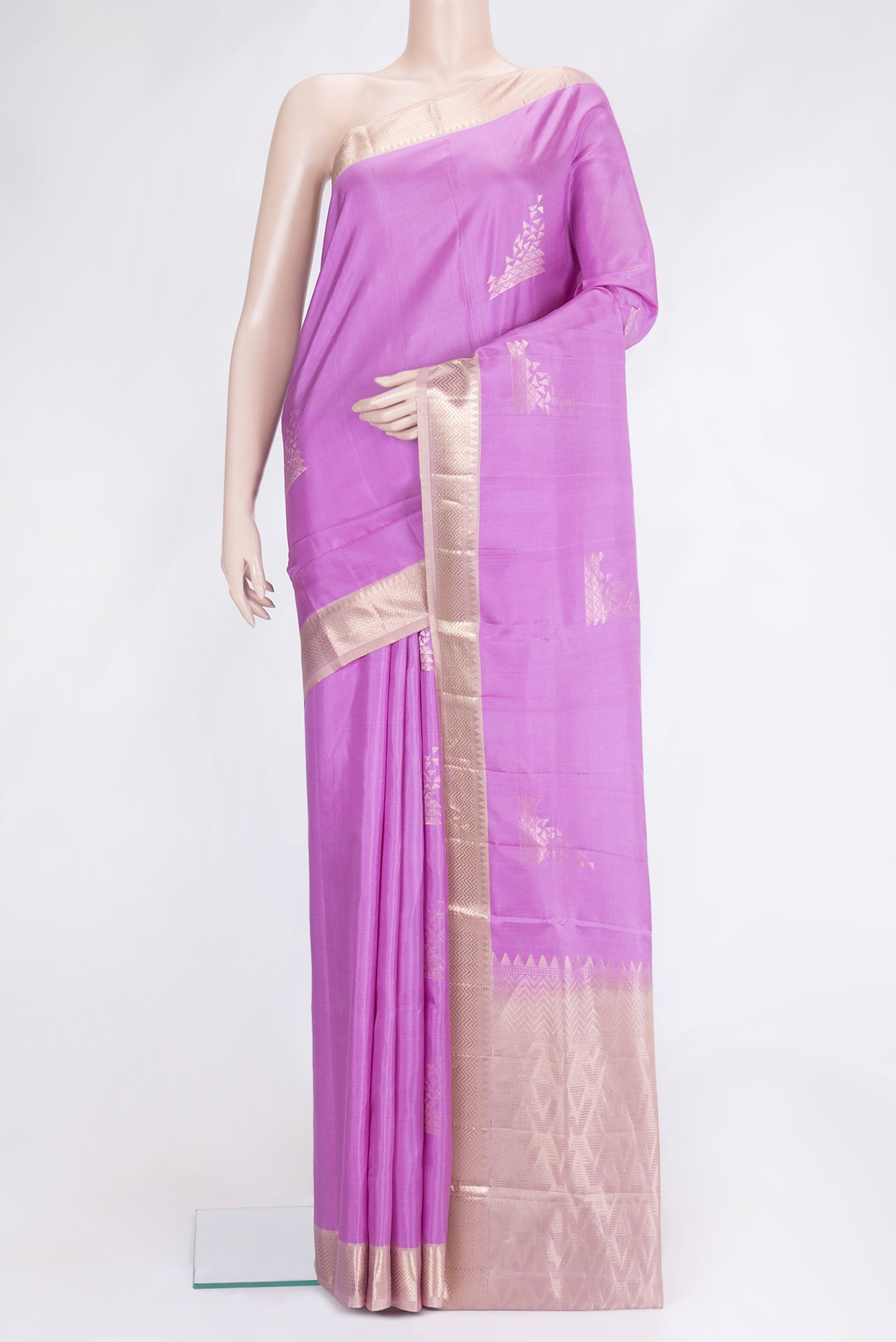 Lavender Dual Tone Soft Silk Saree with Zari Butta on the body and Zari Border.  displayed on a mannequin