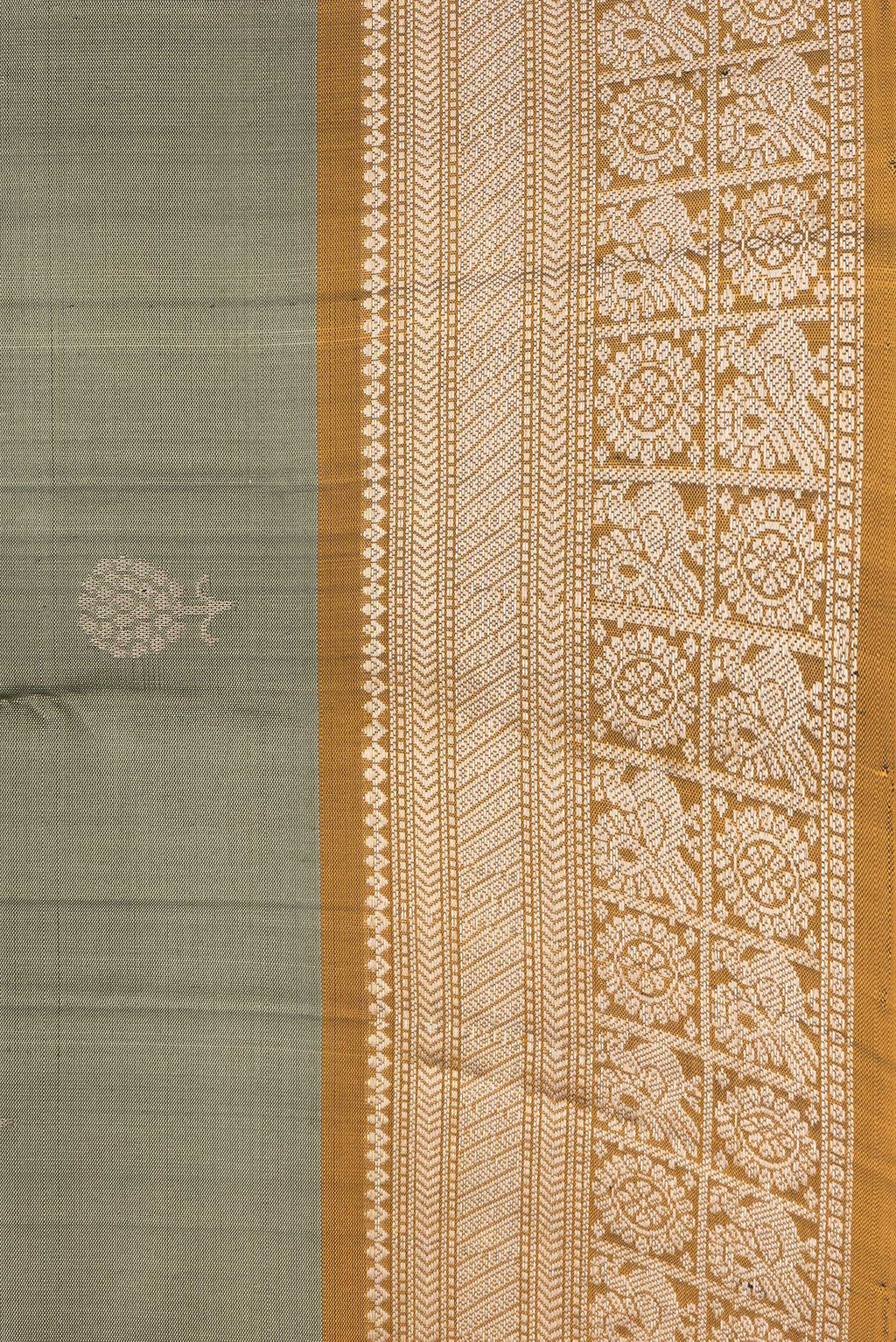 Border image of Mehandi Green Dual Tone Soft Silk Saree with Zari Butta on the body and Zari Border. 