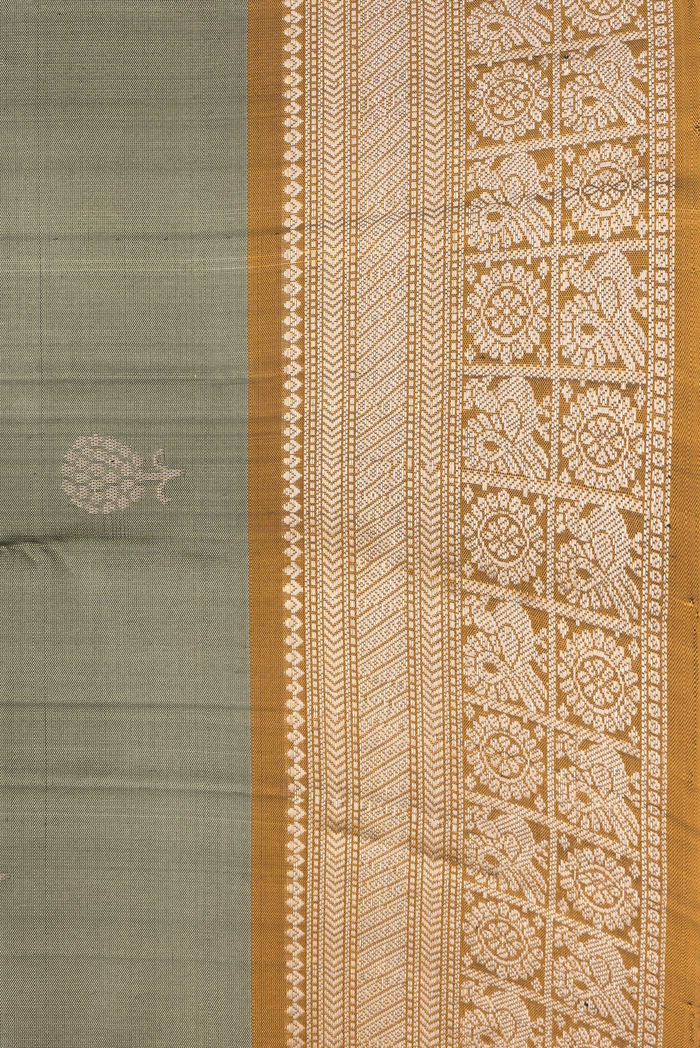 Border image of Mehandi Green Dual Tone Soft Silk Saree with Zari Butta on the body and Zari Border. 