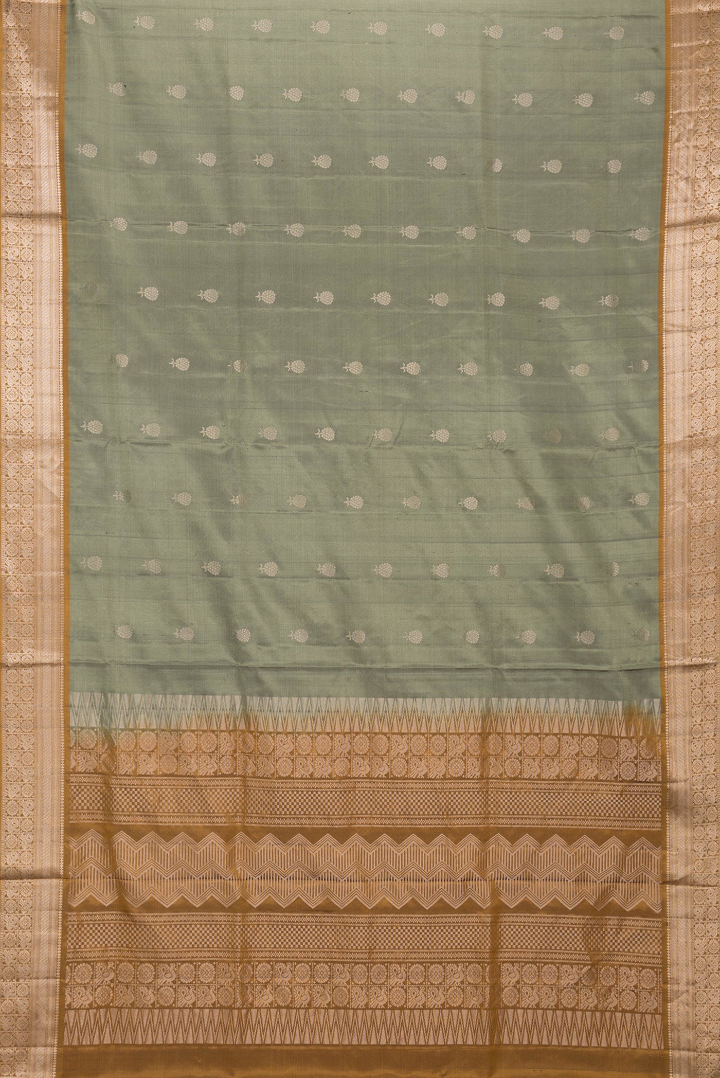 Flat view of Mehandi Green Dual Tone Soft Silk Saree with Zari Butta on the body and Zari Border. 