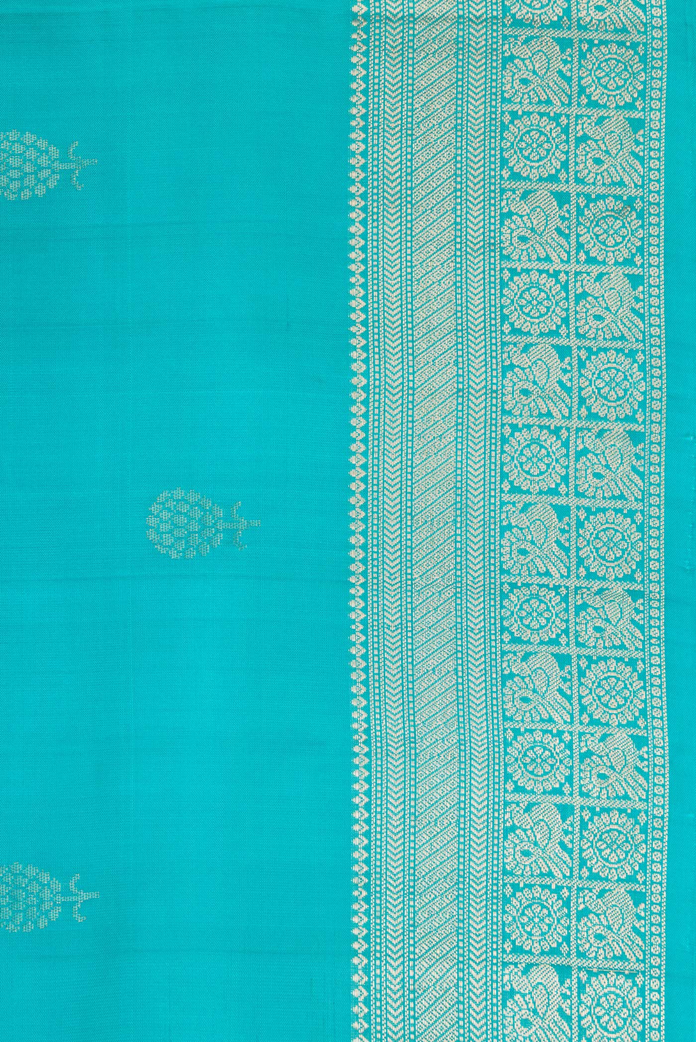 Border image of Maya Blue Dual Tone Soft Silk Saree with Zari Butta on the body and Zari Border. 