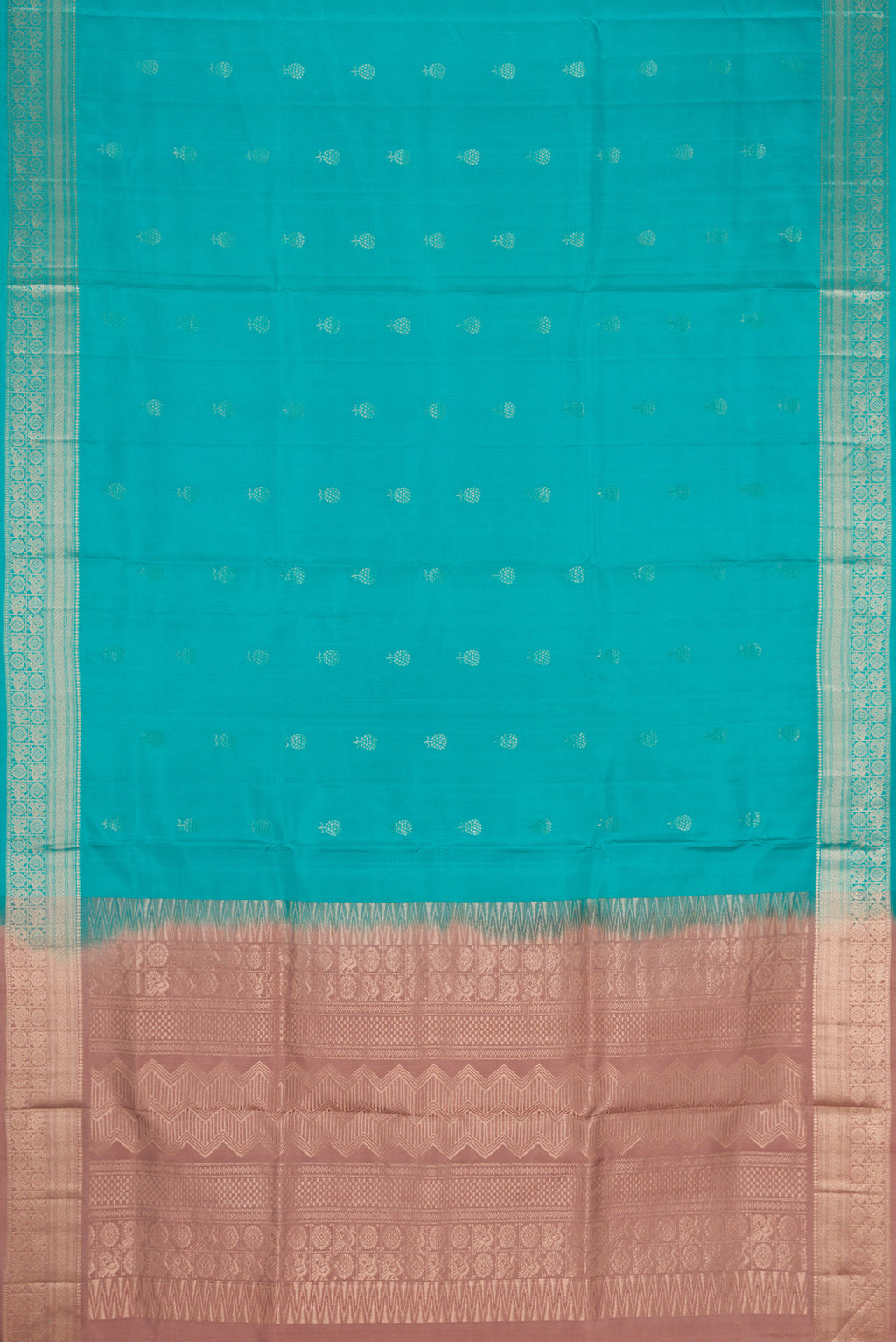 Flat view of Maya Blue Dual Tone Soft Silk Saree with Zari Butta on the body and Zari Border. 