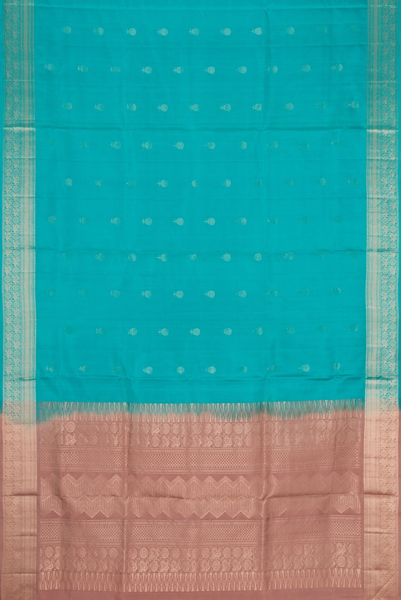 Flat view of Maya Blue Dual Tone Soft Silk Saree with Zari Butta on the body and Zari Border. 