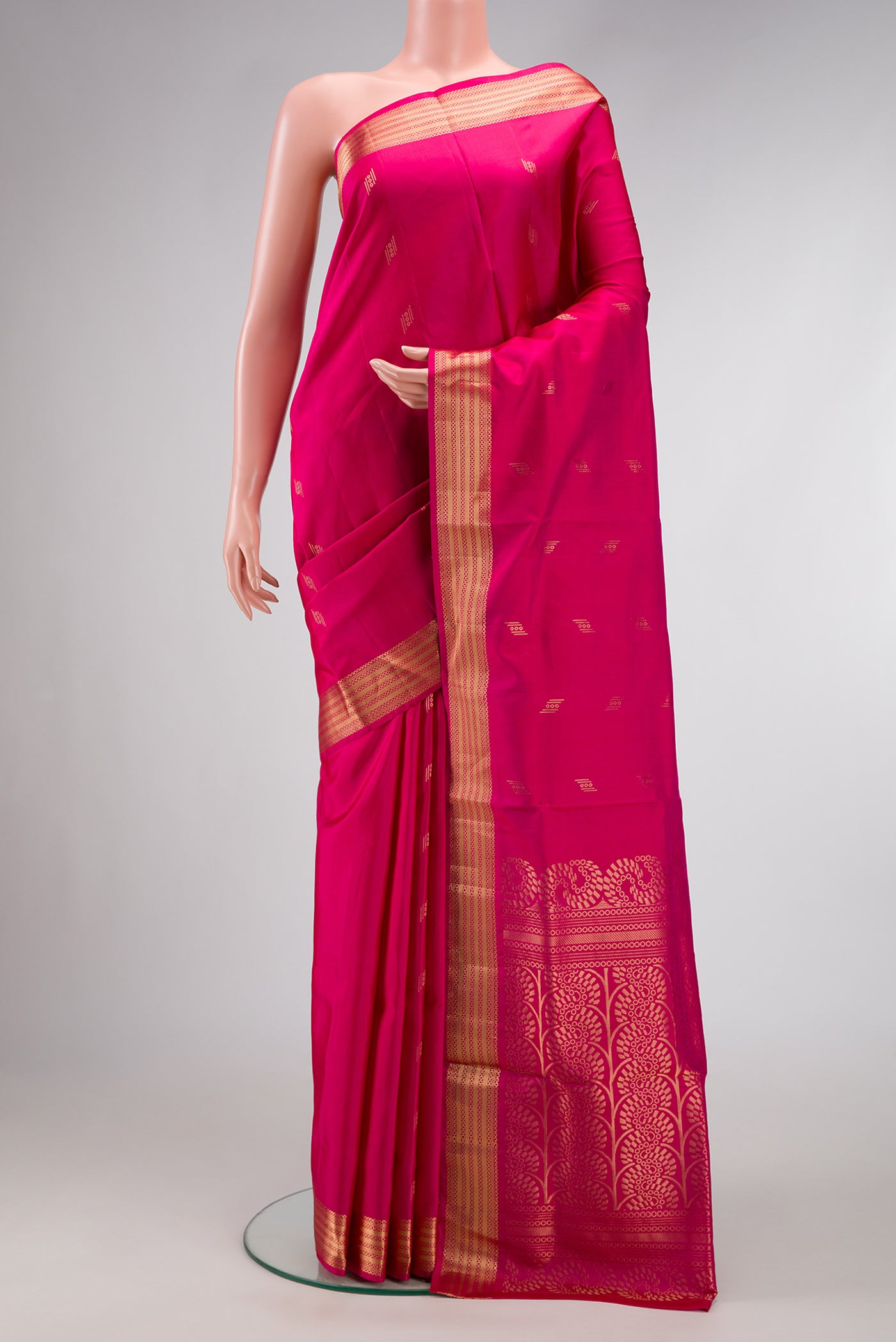 Pink Dual Tone Soft Silk Saree with Zari Butta on the body and Zari Border.  displayed on a mannequin