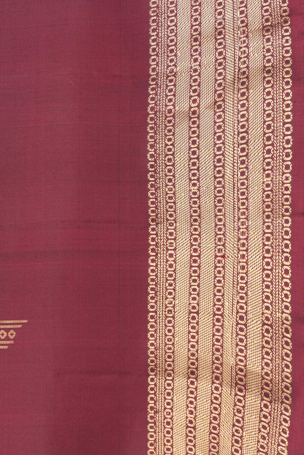Border image of Maroon Dual Tone Soft Silk Saree with Zari Butta on the body and Zari Border. 