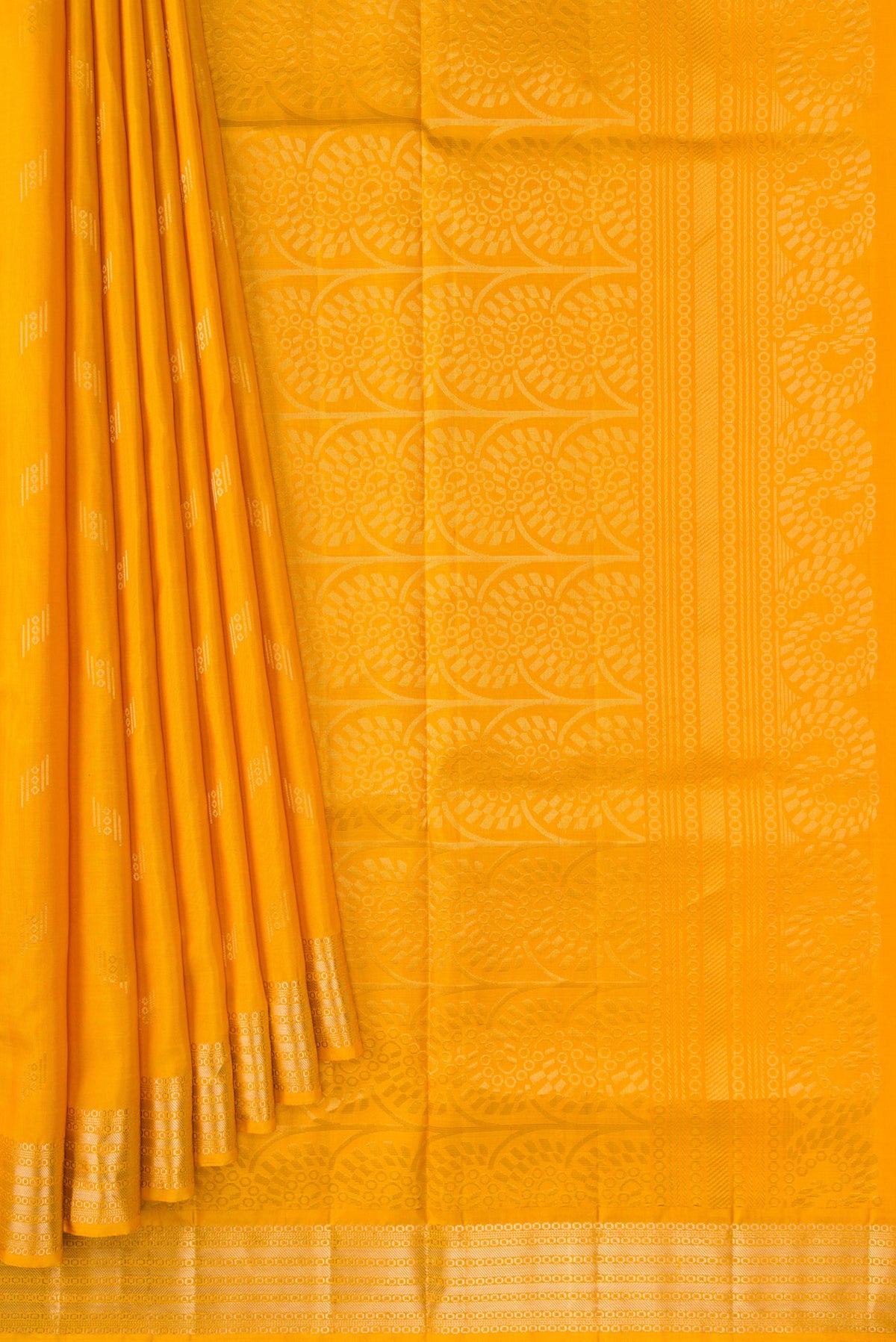 Pleats and pallu of Mustard Dual Tone Soft Silk Saree with Zari Butta on the body and Zari Border. 
