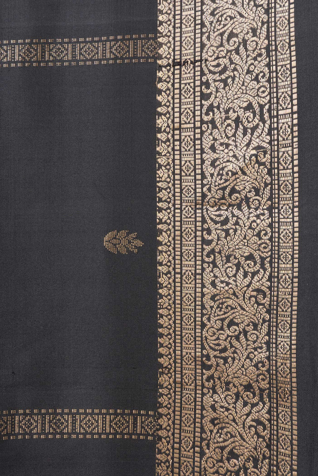 Border image of Black Dual Tone Soft Silk Saree with Zari Butta on the body and Zari Border. 