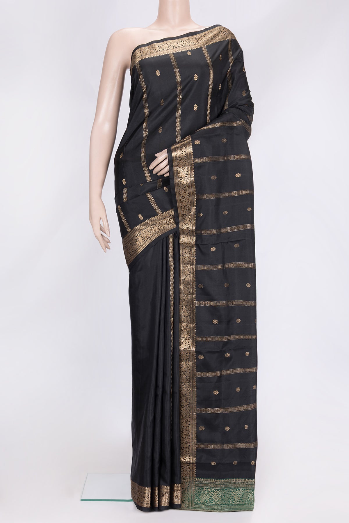Black Dual Tone Soft Silk Saree with Zari Butta on the body and Zari Border.  displayed on a mannequin
